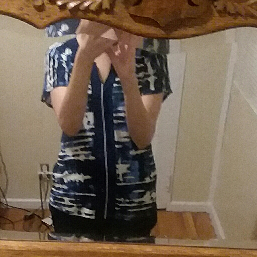 A blue patterned top.